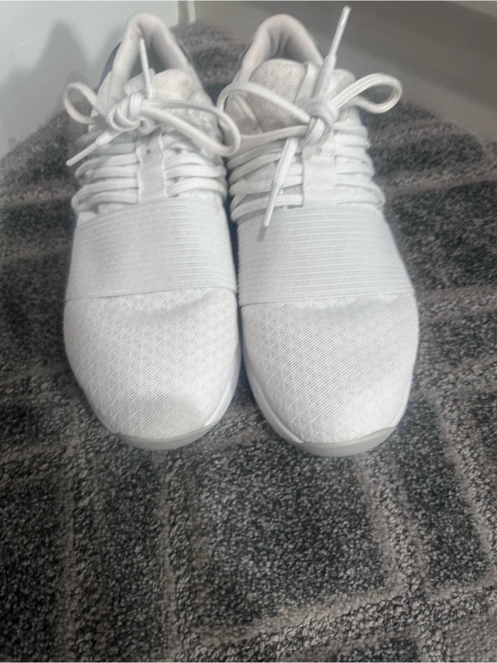 Under Armour Women’s White Athletic Lace-Up Slip-On Sneaker with Silver Accent